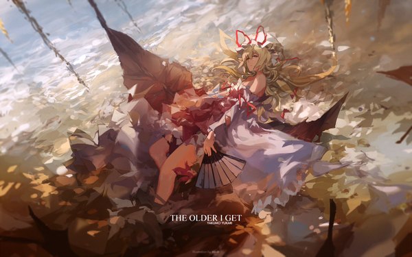 Anime picture 1920x1200 with touhou yakumo yukari mivit single long hair looking at viewer fringe highres breasts blonde hair purple eyes bare shoulders holding signed lying from above blurry on back depth of field character names