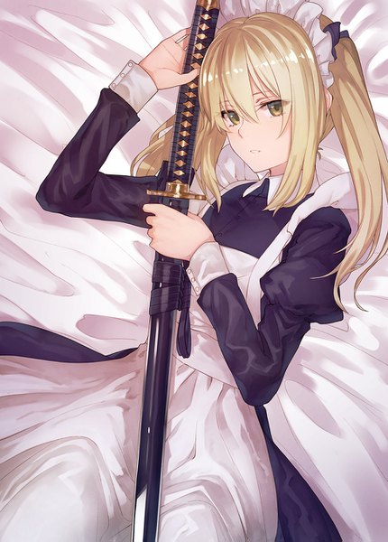 Anime picture 974x1359 with original ibuki notsu single long hair tall image looking at viewer fringe blonde hair smile hair between eyes twintails holding yellow eyes lying parted lips maid on back puffy sleeves sheathed girl