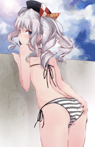 Anime picture 600x925 with kantai collection kashima training cruiser yumesato makura single long hair tall image looking at viewer blush fringe blue eyes light erotic standing twintails bare shoulders payot sky silver hair cloud (clouds) outdoors ass