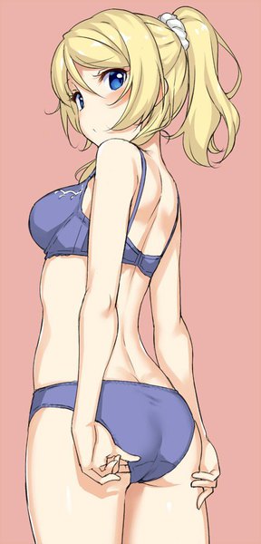 Anime picture 480x1000 with love live! school idol project sunrise (studio) love live! ayase eli takayaki single long hair tall image looking at viewer breasts blue eyes light erotic blonde hair simple background ass ponytail looking back from behind underwear only pink background