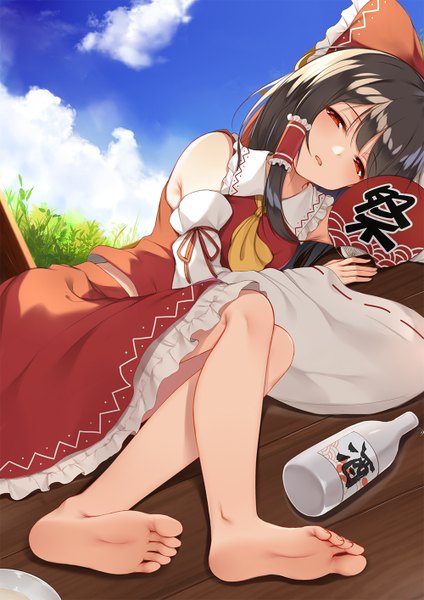 Anime picture 1000x1414 with touhou hakurei reimu flan (seeyouflan) single long hair tall image looking at viewer blush fringe open mouth black hair hair between eyes red eyes bare shoulders sky cloud (clouds) lying barefoot inscription wide sleeves