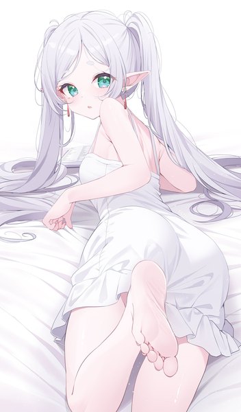 Anime picture 1114x1900 with sousou no frieren frieren deyui single tall image looking at viewer light erotic twintails green eyes silver hair lying very long hair looking back barefoot pointy ears bare legs sleeveless elf on stomach girl