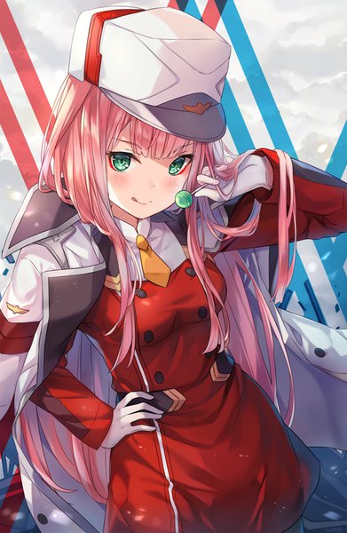 Anime picture 738x1131 with darling in the franxx studio trigger zero two (darling in the franxx) hitsukuya single long hair tall image looking at viewer blush fringe green eyes pink hair hand on hip shaded face clothes on shoulders military girl gloves uniform hat