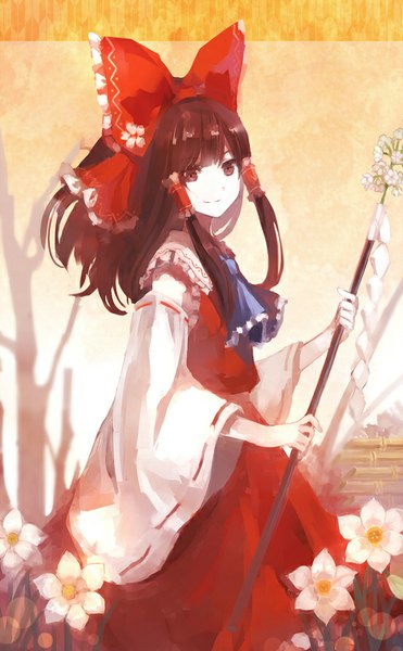 Anime picture 550x889 with touhou hakurei reimu 60mai single long hair tall image looking at viewer fringe smile holding brown eyes outdoors traditional clothes japanese clothes wide sleeves shadow pale skin miko dark hair girl