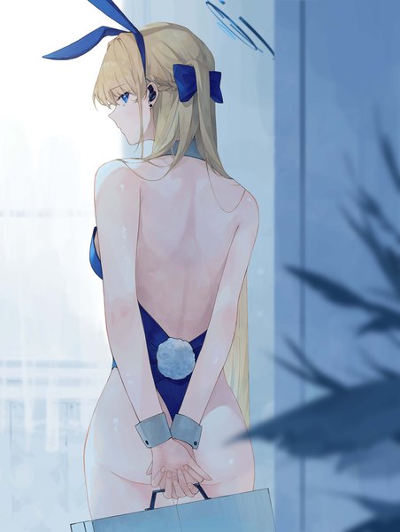 Anime picture 4450x5912 with blue archive toki (blue archive) toki (bunny) (blue archive) randouworks single long hair tall image looking at viewer highres blue eyes light erotic blonde hair animal ears absurdres ass indoors tail animal tail profile looking back