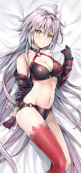 Anime picture 643x1366 with fate (series) fate/grand order jeanne d'arc (fate) (all) jeanne d'arc alter (fate) jeanne d'arc alter (swimsuit berserker) (fate) kotatsu (kotatsu358) single tall image looking at viewer blush fringe breasts light erotic hair between eyes large breasts bare shoulders yellow eyes cleavage silver hair ahoge
