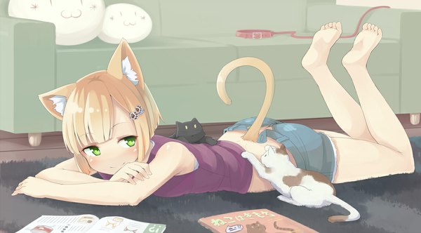 Anime picture 1138x631 with original inu (kuroinu0720) blush short hair blonde hair wide image green eyes animal ears lying cat ears cat girl cat tail girl shorts cat