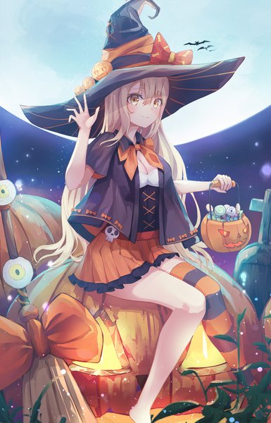 Anime picture 1500x2339 with original doroshi single long hair tall image fringe blonde hair hair between eyes sitting holding yellow eyes cleavage pleated skirt light smile halloween waving girl thighhighs skirt hat