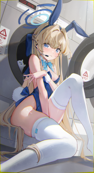 Anime picture 1780x3280 with blue archive toki (blue archive) toki (bunny) (blue archive) lazy cat single long hair tall image looking at viewer blush fringe highres breasts blue eyes light erotic blonde hair hair between eyes sitting animal ears bent knee (knees) indoors