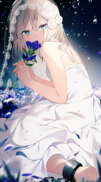 Anime picture 559x1000 with original achiki single tall image looking at viewer blush fringe short hair blue eyes hair between eyes sitting bare shoulders holding hair flower grey hair tears hands clasped chained girl dress