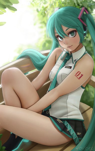 Anime picture 1260x1995 with vocaloid hatsune miku novcel single tall image looking at viewer fringe breasts light erotic hair between eyes sitting twintails bare shoulders signed bent knee (knees) very long hair head tilt aqua eyes blurry aqua hair