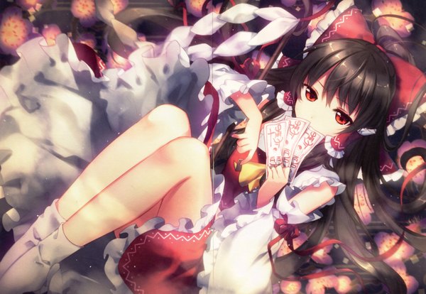 Anime picture 3057x2112 with touhou hakurei reimu riichu single long hair looking at viewer fringe highres black hair red eyes twintails holding absurdres bent knee (knees) lying traditional clothes japanese clothes scan wide sleeves on back