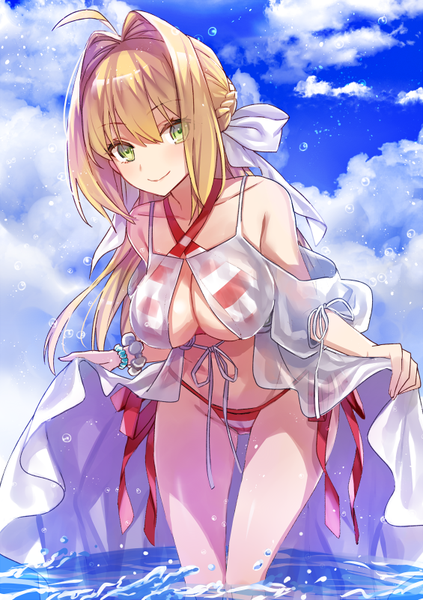 Anime picture 565x800 with fate (series) fate/grand order nero claudius (fate) (all) nero claudius (swimsuit caster) (fate) yuzuki karu single long hair tall image looking at viewer blush fringe breasts light erotic blonde hair smile hair between eyes large breasts standing bare shoulders holding