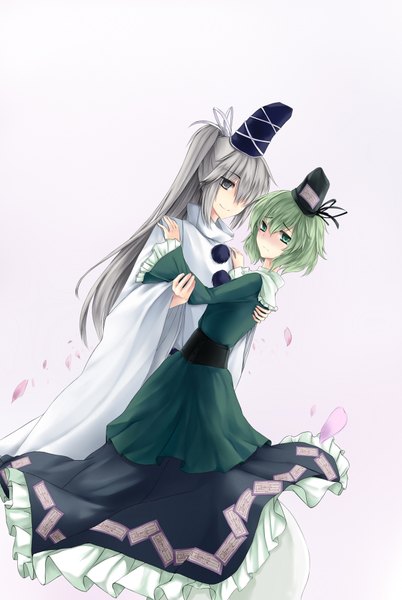 Anime picture 1207x1800 with touhou mononobe no futo soga no tojiko hug (yourhug) long hair tall image short hair simple background white background multiple girls green eyes silver hair ponytail green hair silver eyes girl dress 2 girls hat petals