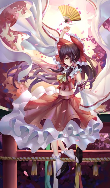 Anime picture 1000x1703 with touhou hakurei reimu aaeru single long hair tall image black hair brown eyes traditional clothes japanese clothes miko girl skirt bow hair bow petals socks white socks skirt set fan