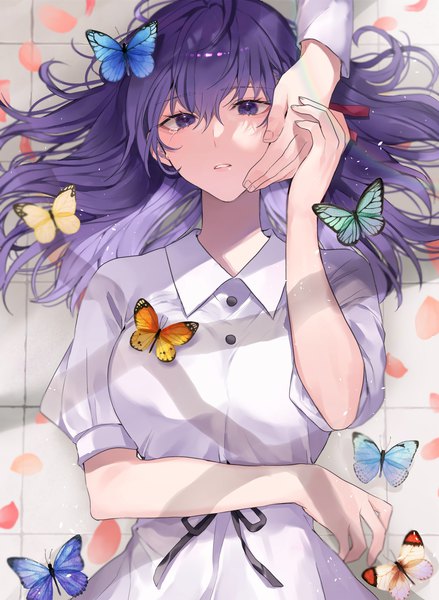Anime picture 1641x2244 with fate (series) fate/stay night matou sakura shimatori (sanyyyy) long hair tall image looking at viewer fringe hair between eyes purple eyes purple hair lying parted lips from above short sleeves on back solo focus hand on another's face girl dress