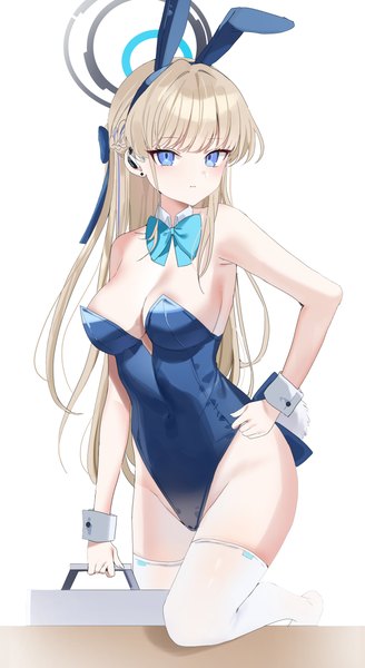 Anime picture 2145x3922 with blue archive toki (blue archive) toki (bunny) (blue archive) educk single long hair tall image looking at viewer blush fringe highres breasts blue eyes light erotic simple background blonde hair large breasts standing white background holding
