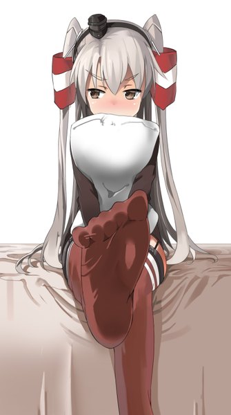 Anime picture 872x1559 with kantai collection amatsukaze destroyer akihito (slotlove) single long hair tall image blush fringe simple background hair between eyes white background sitting brown eyes looking away silver hair two side up embarrassed soles pov feet pillow hug