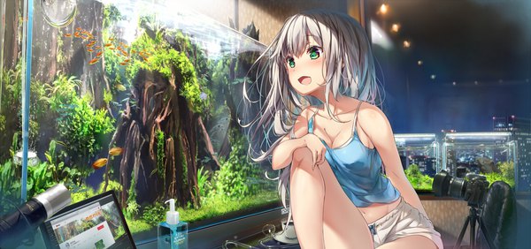 Anime picture 1400x660 with original wingheart single long hair blush fringe breasts open mouth light erotic smile hair between eyes wide image sitting bare shoulders green eyes looking away cleavage silver hair indoors :d