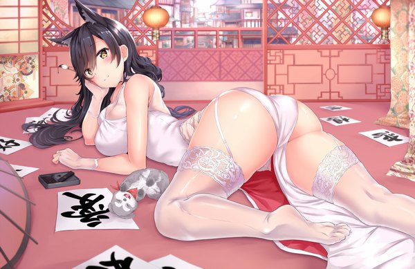 Anime picture 1181x766 with azur lane atago (azur lane) yukishiro arute single long hair looking at viewer blush fringe breasts light erotic black hair smile hair between eyes large breasts brown eyes animal ears ass indoors lying traditional clothes