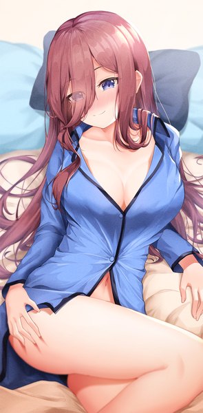 Anime picture 1248x2539 with go-toubun no hanayome nakano miku lancheu single long hair tall image looking at viewer blush fringe breasts blue eyes light erotic smile brown hair large breasts cleavage lying long sleeves light smile hair over one eye