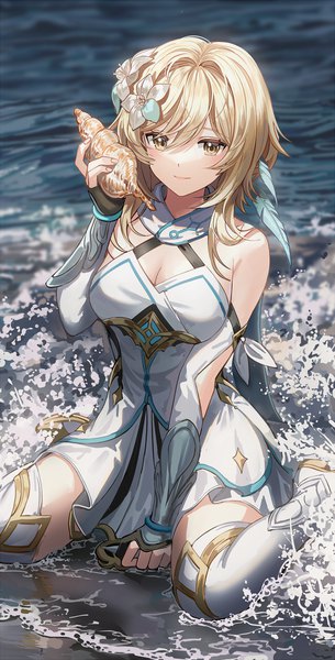 Anime picture 600x1179 with genshin impact lumine (genshin impact) silence girl single tall image looking at viewer blush fringe breasts blonde hair hair between eyes sitting holding yellow eyes cleavage outdoors arm up hair flower light smile partially submerged