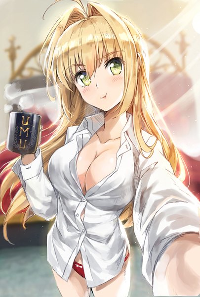 Anime picture 608x900 with fate (series) fate/extra nero claudius (fate) (all) nero claudius (fate) tonee single long hair tall image blush fringe breasts light erotic blonde hair hair between eyes large breasts standing holding green eyes payot cleavage