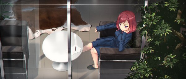 Anime picture 2500x1063 with love live! school idol project sunrise (studio) love live! nishikino maki meda single blush fringe highres short hair hair between eyes wide image sitting purple eyes full body red hair indoors from above sleeves past wrists chin rest