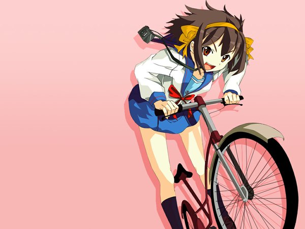 Anime picture 1024x768 with suzumiya haruhi no yuutsu kyoto animation suzumiya haruhi jaderabbit single looking at viewer short hair open mouth simple background smile brown hair brown eyes long sleeves pink background riding girl uniform ribbon (ribbons) hair ribbon serafuku